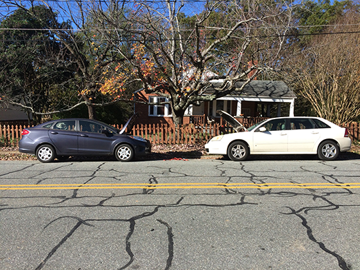 two cars nose to nose