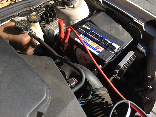 jumper cable terminal connected to positive terminal of donor car