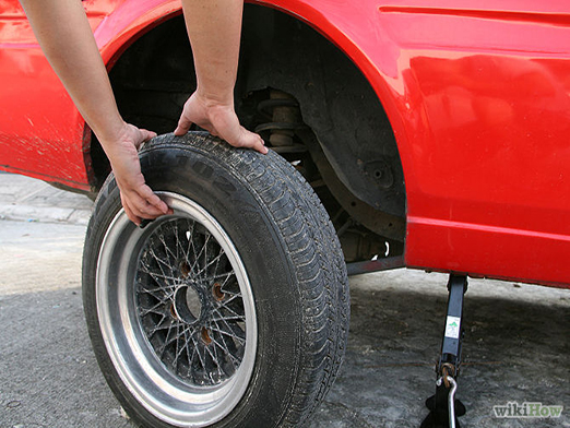 removing a tire from a car